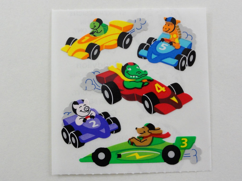 Sandylion Animal in Race Car Sticker Sheet / Module - Vintage & Collectible